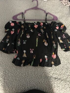 H&M Black Off-Shoulder Ruffle Top with Perfume Bottle & Bow Print